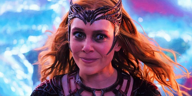 elizabeth-olsen-as-scarlet-witch-in-full-costume-with-a-deranged-smile-in-doctor-strange-in-the-multiverse-of-madness.jpg