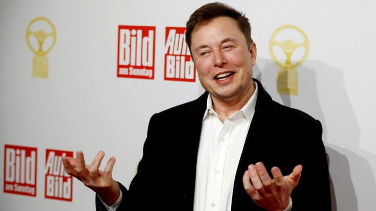 elon_musk_tesla_reuters_1677244645978.jpg