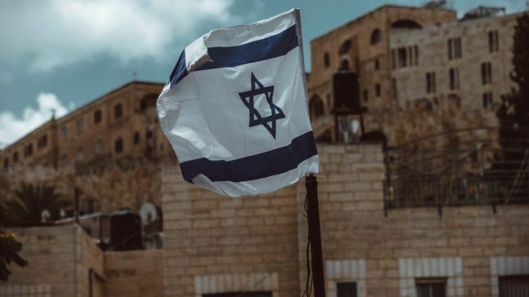 israel_flag_unsplash_Taylor_Brandon_large_1646133412373.jpg