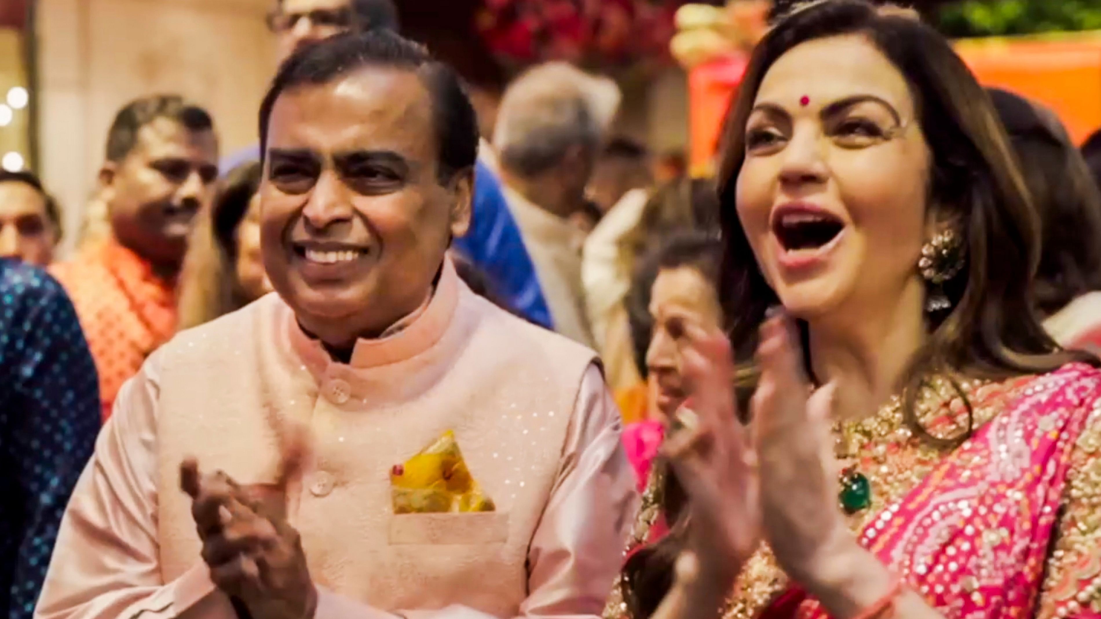 Reliance Industries Chairman Mukesh Ambani and his wife Nita Ambani during a ceremony ahead of the wedding of their son Anant Ambani and Radhika Merchant, at Antilia, in Mumbai.