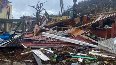 nternational Organization for Migration/Reuters The remains of a building flattened by Hurricane Beryl