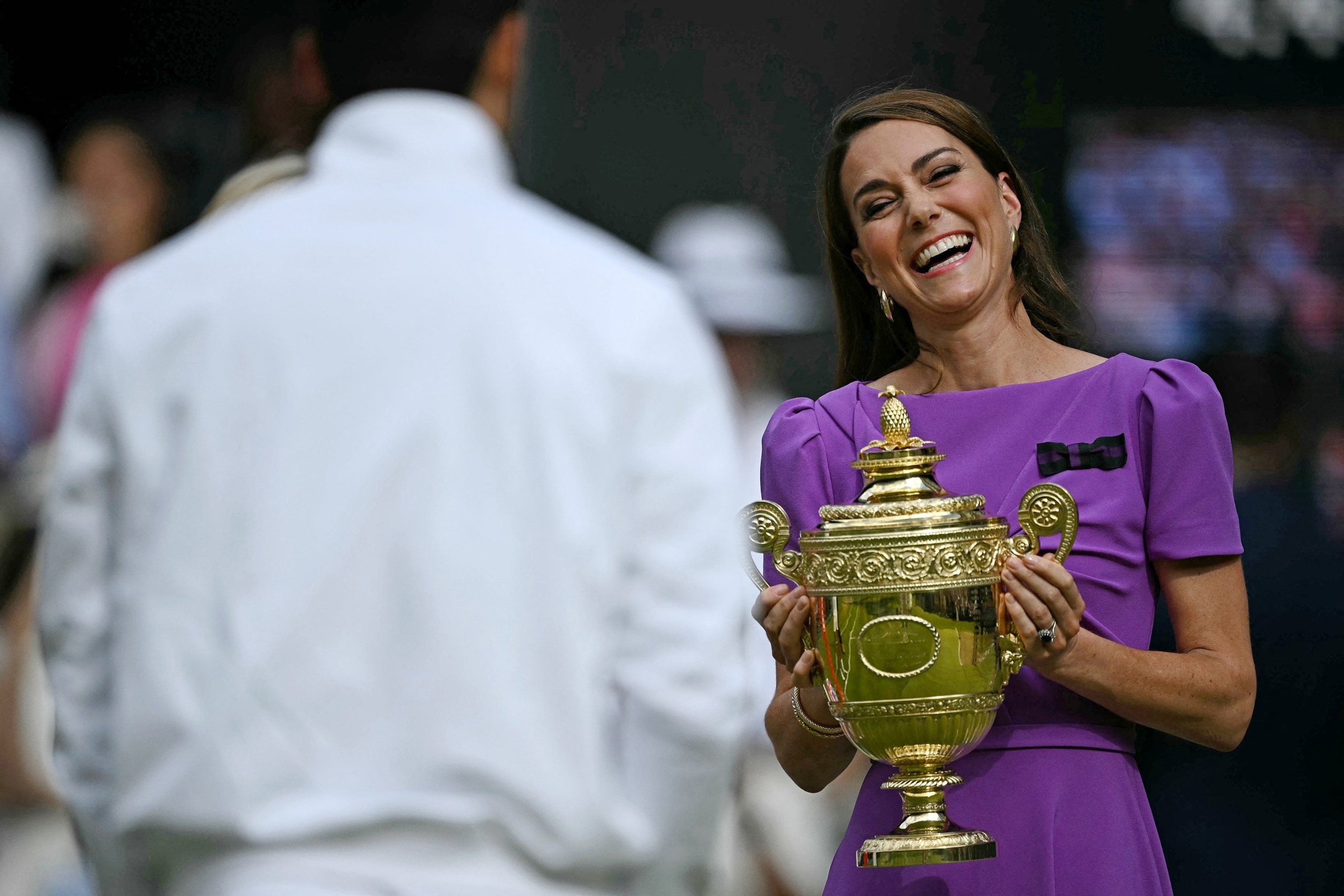 PHOTO: Britain's Catherine, Princess of Wales prepares to give the winner's trophy to Spain's Carlos Alcaraz following his victory at 2024 Wimbledon Championships, southwest London, on July 14, 2024. 