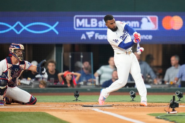 Dodgers outfielder Teoscar Hernández connects during the All-Star Home Run...