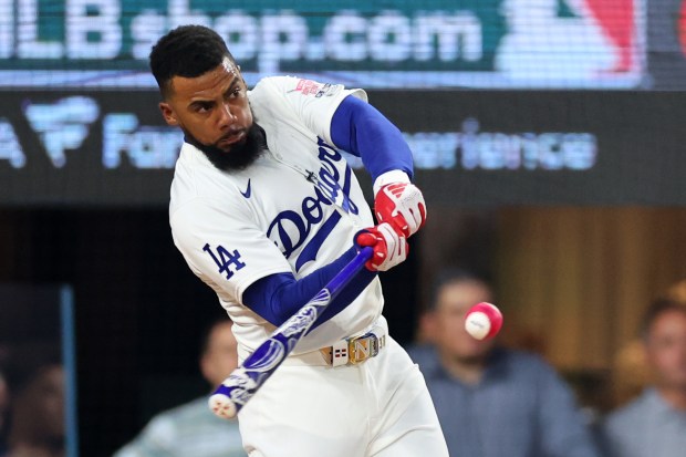 Dodgers outfielder Teoscar Hernández bats during the Home Run Derby...