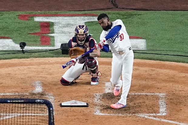 Dodgers outfielder Teoscar Hernández hits a home run during the...