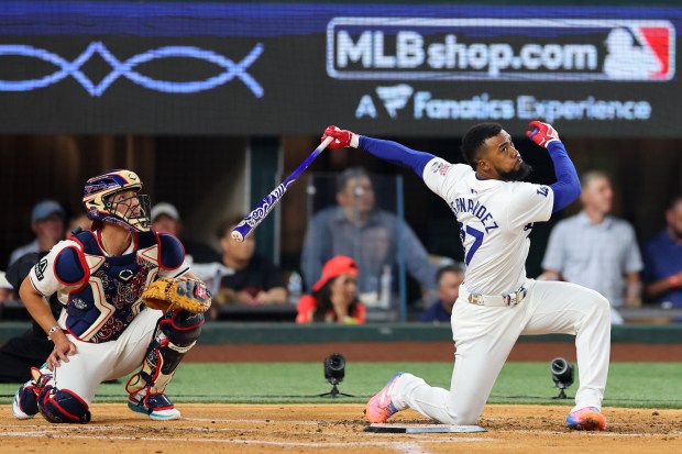 Dodgers outfielder Teoscar Hernández bats during the Home Run Derby...