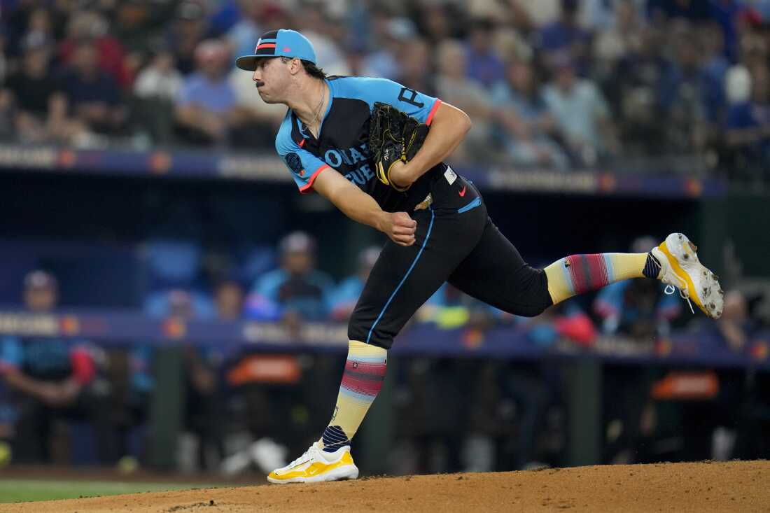 National League pitcher Paul Skenes, of the Pittsburgh Pirates, throws to an American League batter in the first inning during the MLB All-Star baseball game, Tuesday in Arlington, Texas.