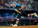 National League pitcher Paul Skenes, of the Pittsburgh Pirates, throws to an American League batter in the first inning during the MLB All-Star baseball game, Tuesday in Arlington, Texas. 