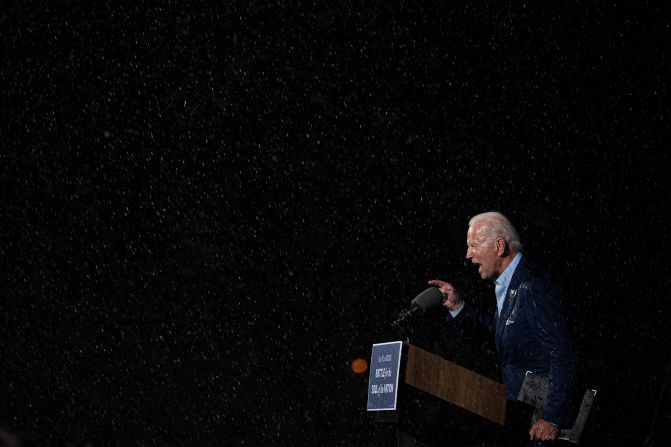 Biden delivers remarks in the rain during a drive-in rally in Tampa, Florida, in October 2020.