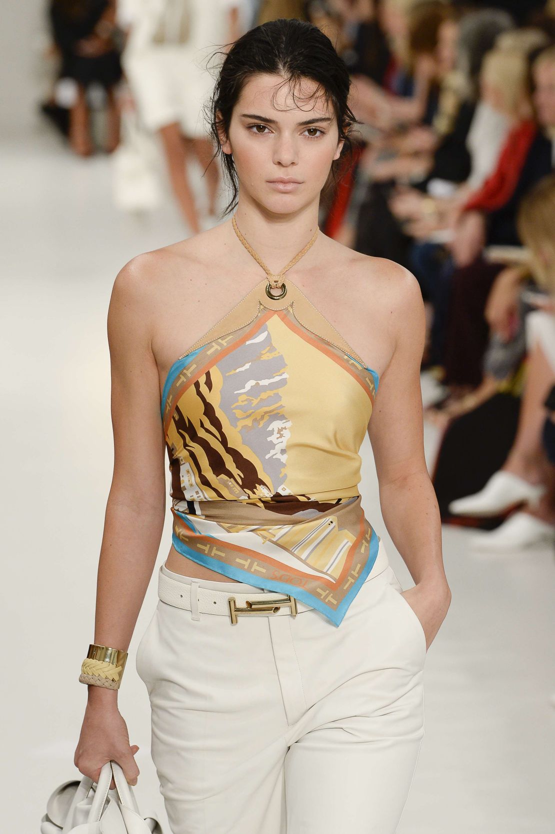 Kendall Jenner in a triangle top on the catwalk for Tod's Spring-Summer 2018 show.