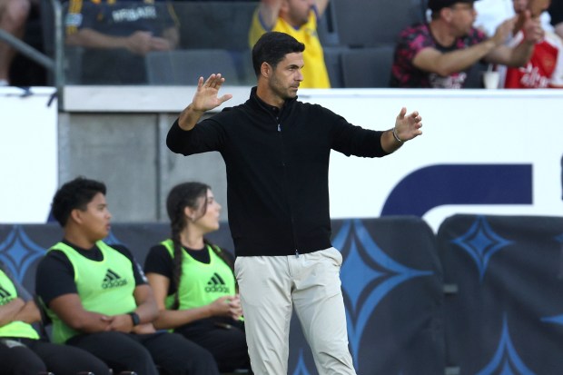 Arsenal head coach Mikel Arteta reacts on the sideline during...