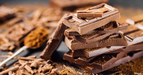 Bars of chocolate and chocolate shavings.