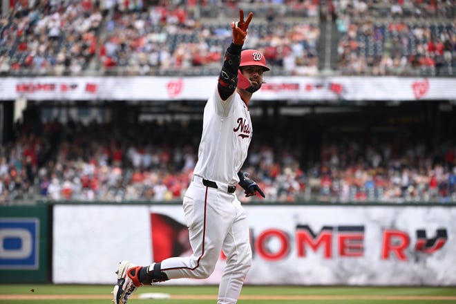 Washington Nationals left fielder Jesse Winker (6) celebrates as he rounds the bases after hitting a home run against the New York Mets during the eighth inning on July 4, 2024, at Nationals Park.