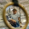 Hobie Biliouris, 14, of the Arlington Tigers gymnastics team practices on the rings at the Barcroft Sports & Fitness Center in Arlington, Va., on July 2. He recently joined the Tigers after his previous team ended its boys program.