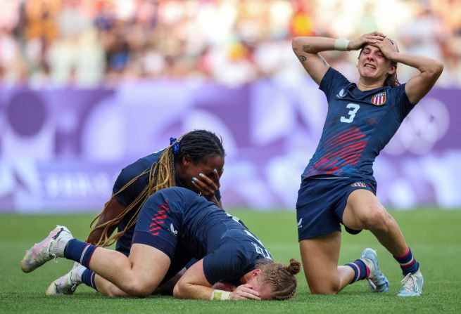 The United States' Naya Tapper, Alev Kelter and Kayla Canett celebrate after their team finished a <a href=