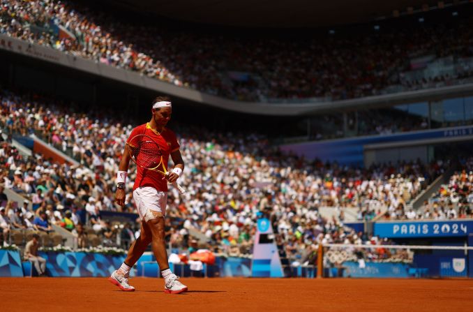 Spain's Rafael Nadal reacts while playing Serbia's Novak Djokovic in a second-round match on July 29. Djokovic defeated his longtime rival in an <a href=