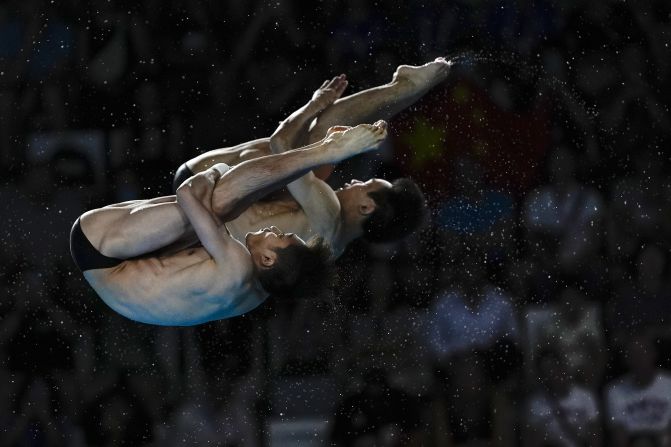 Chinese divers Lian Junjie and Yang Hao compete in the synchronized 10-meter platform event on July 29. The duo <a href=