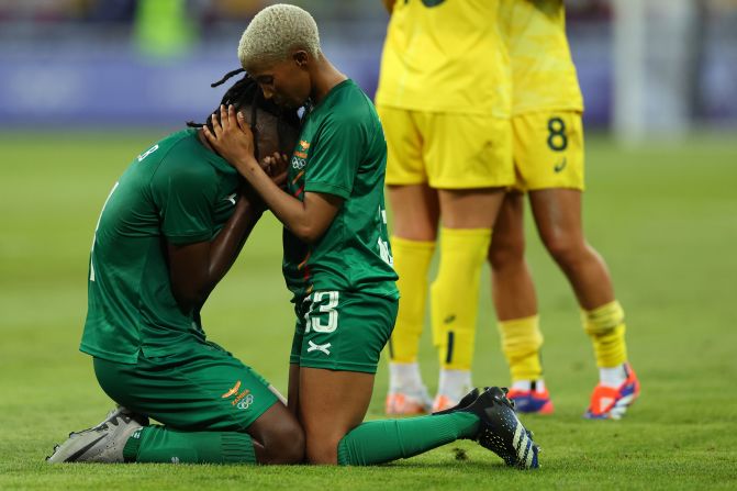 Zambia's Martha Tembo consoles teammate Barbra Banda after Australia <a href=