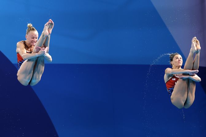 US divers Sarah Bacon, left, and Kassidy Cook compete in the synchronized 3-meter springboard event on July 27. They earned silver — <a href=