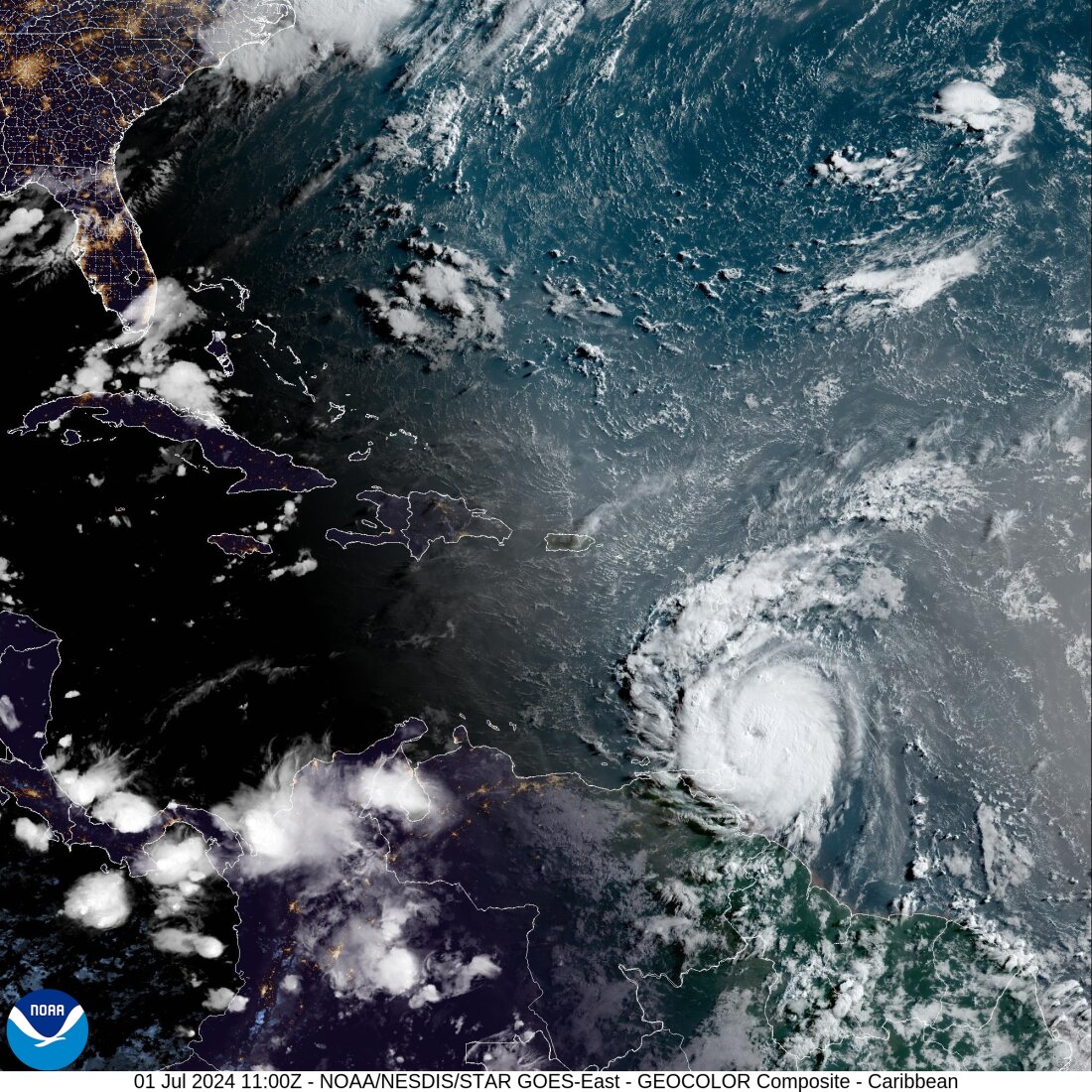 Hurricane Beryl loomed toward St. Vincent — and grew in power — as it brought threats of catastrophic winds and dangerous storm surges to Windward Islands. The storm is seen here in a satellite image just after sunrise Monday morning.