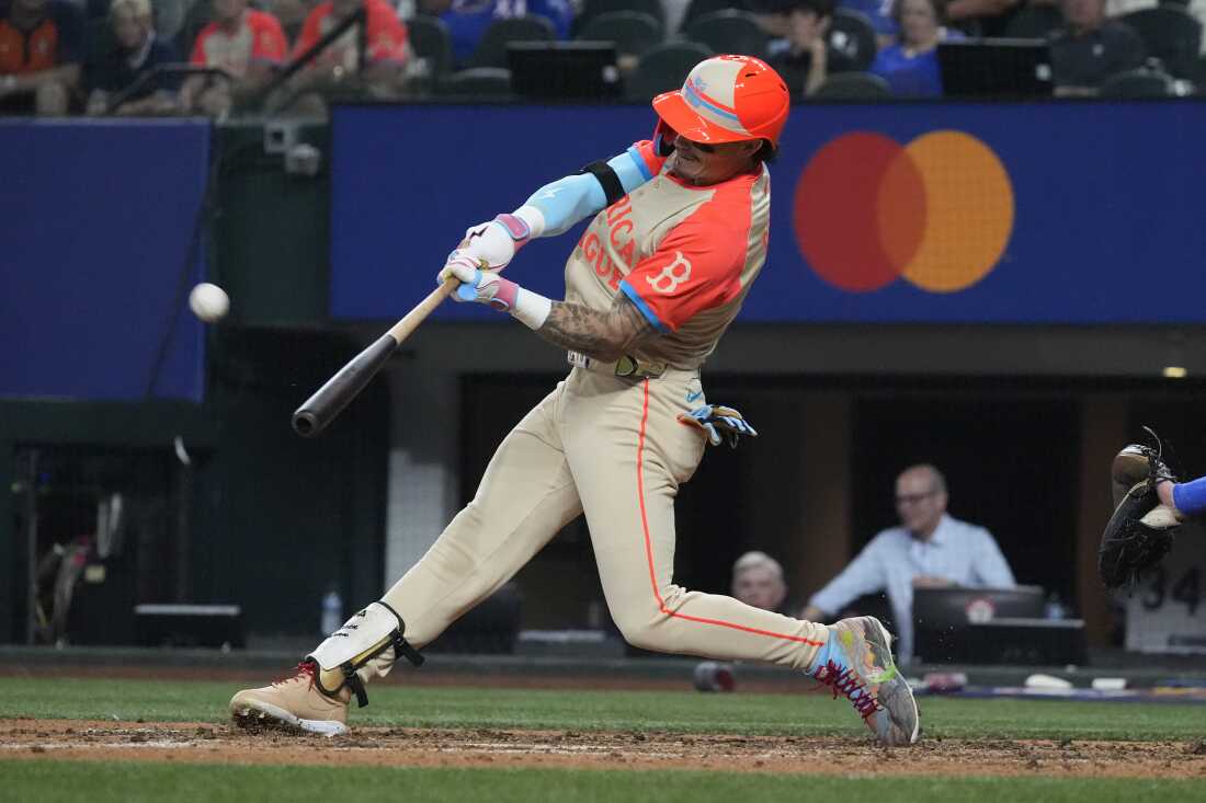 The American League's Jarren Duran of the Boston Red Sox hits a home run during the fifth inning of the MLB All-Star baseball game, Tuesday in Arlington, Texas.