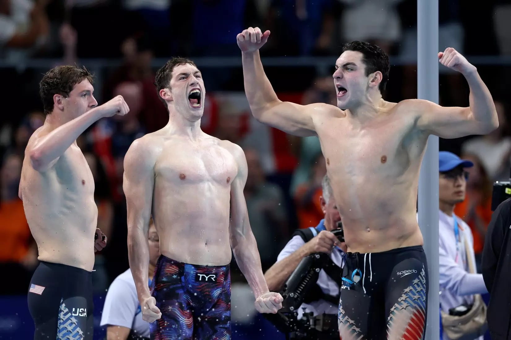 Former Ohio State swimmer Hunter Armstrong (center) and Team USA won the first gold medal of the 2024 Paris Olympics for Team USA with a win in the 4x100 free relay on Saturday. Credit: Getty Images via OSU Athletics