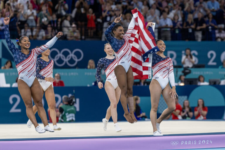 Paris-Olympics-Simone-Biles-celebrates-USAs-gymnastics-gold-medal-with.jpeg