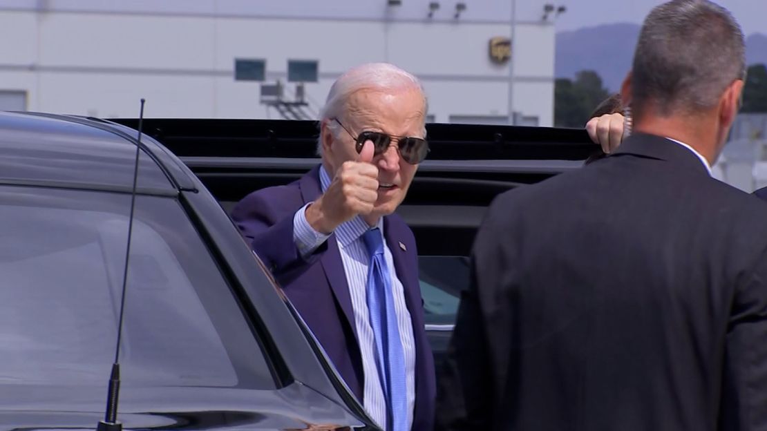 President Joe Biden gives a thumbs-up as he prepares to board Air Force One in Las Vegas on July 17, 2024, after testing positive for Covid-19.