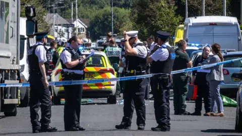 PA Media Police in Southport, Merseyside, where a man has been detained and a knife has been seized after a number of people were injured in a reported stabbing