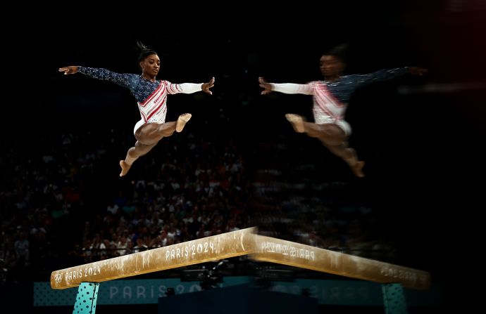 US gymnast Simone Biles performs on the balance beam during the team final on July 30. Biles and Team USA <a href=