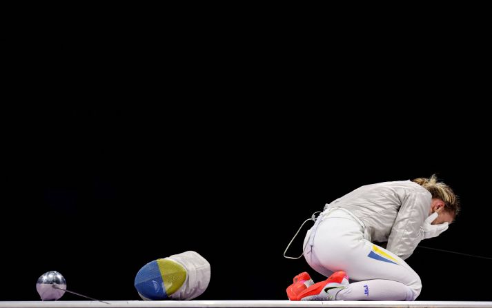 Ukrainian fencer Olga Kharlan reacts after <a href=