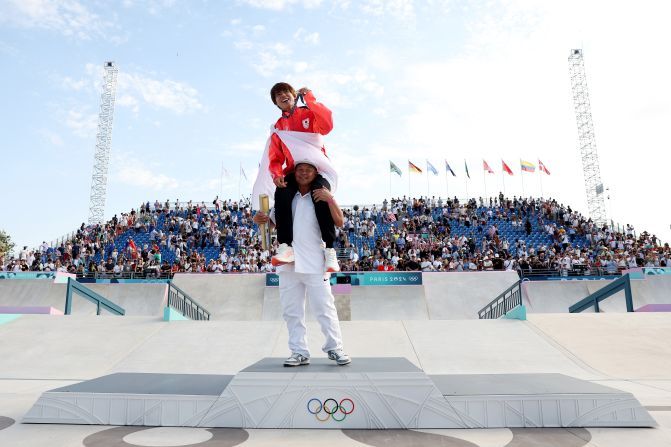 Japanese skateboarder Yuto Horigome celebrates with his gold medal after <a href=