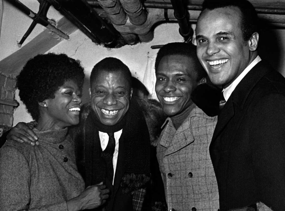 Cicely Tyson, James Baldwin, guest and singer Harry Belafonte attend To Be Young, Gifted And Black Gala on January 2, 1969 at the Cherry Lane Theater in New York City.