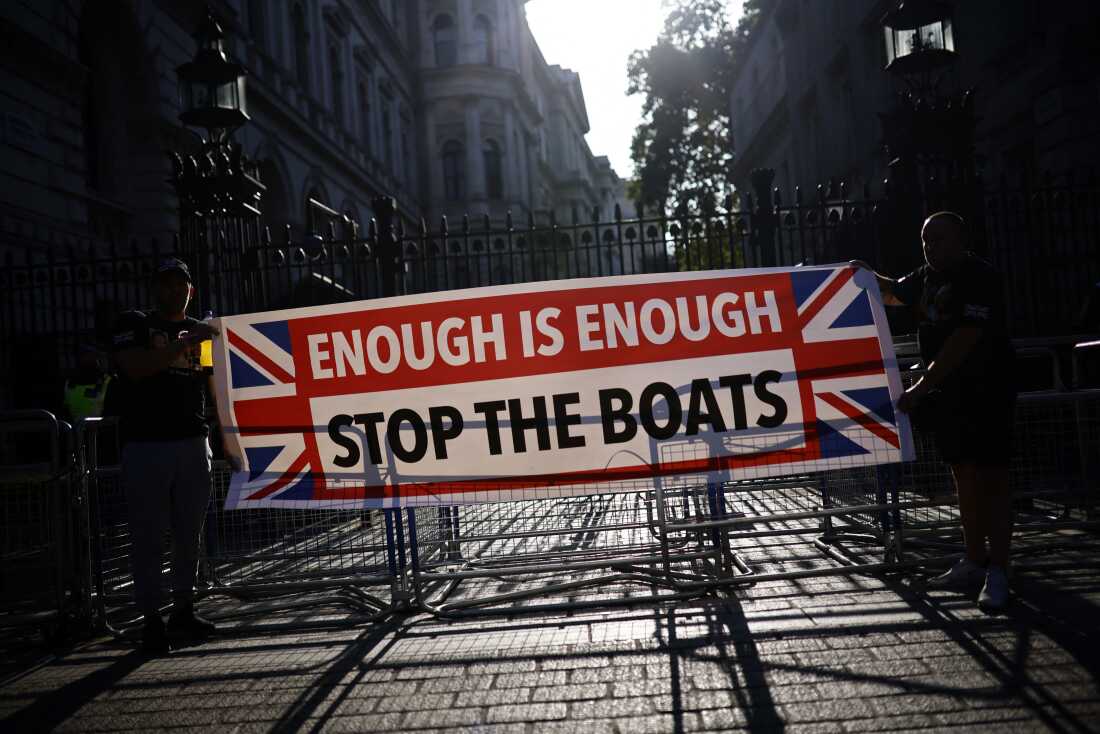 Protestors held a banner reading 