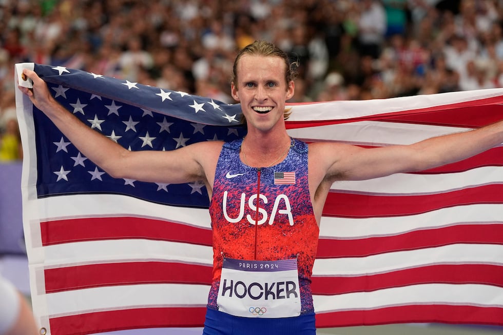 Cole Hocker, of the United States, celebrates after winning the men's 1500-meter final at the...