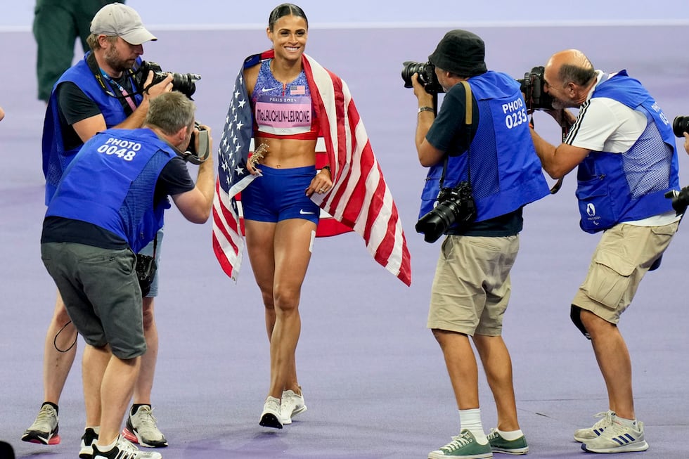 Sydney McLaughlin-Levrone, of the United States, celebrates wining the gold medal in the...