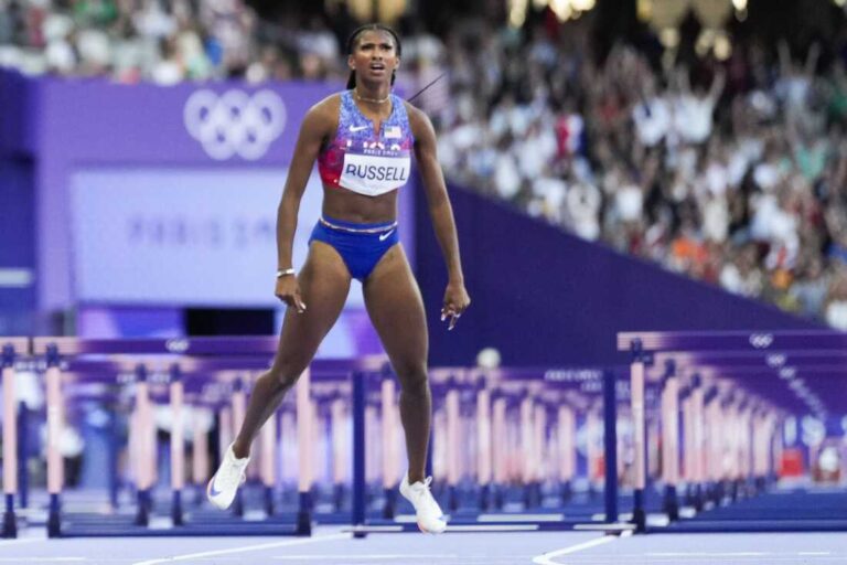 1723335614_American-Masai-Russell-wins-gold-in-100-meter-hurdle-by.jpg