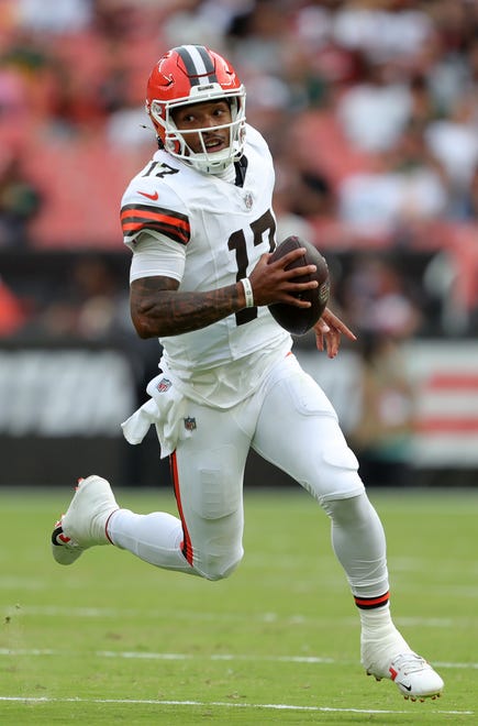 Cleveland Browns quarterback Dorian Thompson-Robinson (17) runs for a first down during the second half of an NFL preseason football game at Cleveland Browns Stadium, Saturday, Aug. 10, 2024, in Cleveland, Ohio.