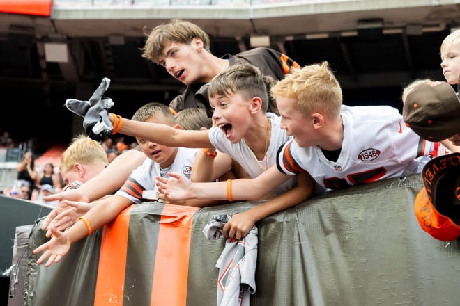 Aug 10, 2024; Cleveland, Ohio, USA; Cleveland Browns fans cheer for the team before the game between the Browns and the Green Bay Packers at Cleveland Browns Stadium. Mandatory Credit: Ken Blaze-USA TODAY Sports