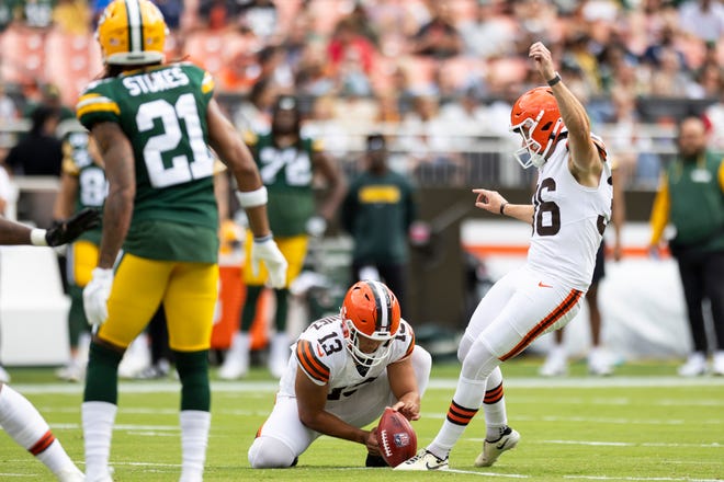 Aug 10, 2024; Cleveland, Ohio, USA; Cleveland Browns place kicker Cade York (36) kicks a 55-yard field goal on a hold by punter Corey Bojorquez (13) during the first quarter against the Green Bay Packers at Cleveland Browns Stadium. Mandatory Credit: Scott Galvin-USA TODAY Sports