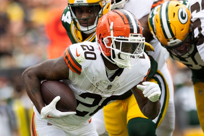 Aug 10, 2024; Cleveland, Ohio, USA; Cleveland Browns running back Pierre Strong Jr. (20) runs the ball against the Green Bay Packers during the second quarter at Cleveland Browns Stadium. Mandatory Credit: Scott Galvin-USA TODAY Sports