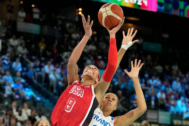 Aug 11, 2024; Paris, France; United States forward A'Ja Wilson (9) shoots against France centre Iliana Rupert (12) in the first half in the women's gold medal game during the Paris 2024 Olympic Summer Games at Accor Arena. Mandatory Credit: Kyle Terada-USA TODAY Sports