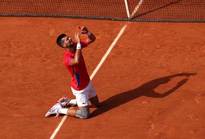 Serbia's Novak Djokovic celebrates after he defeated Spain's Carlos Alcaraz to win gold on August 4. It was <a href=