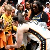 Caitlin Clark, the heralded Indiana Fever rookie, signs autographs after a game Friday against the Washington Mystics that was attended by more than 20,000 fans, the highest attendance for a WNBA game in 17 years.