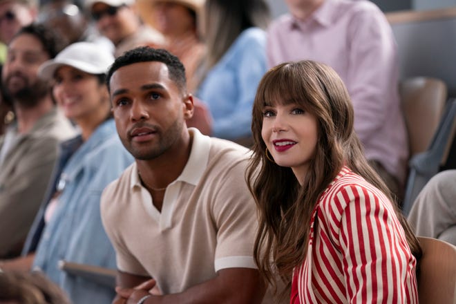 Lucien Laviscount as Alfie, Lily Collins as Emily in Season 4 of "Emily in Paris."