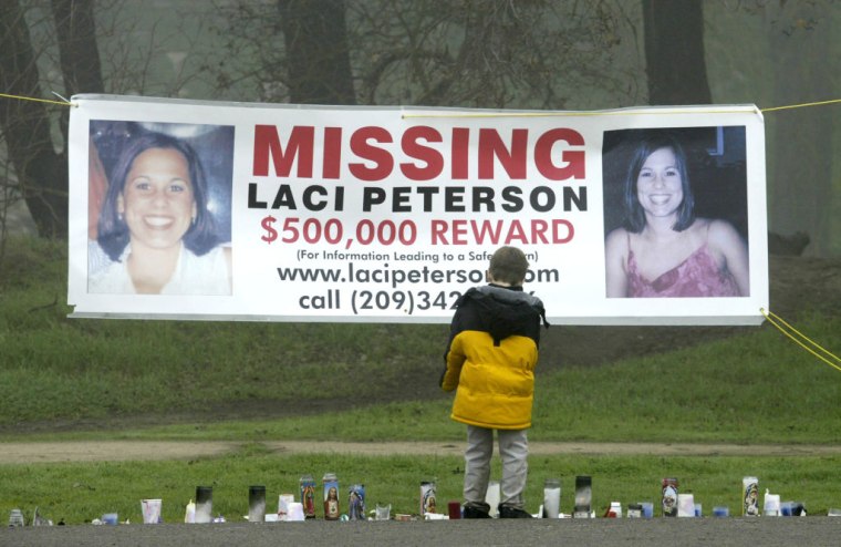 Child Stops To Look At Makeshift Memorial For Still Missing California Woman