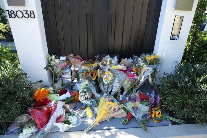 Flowers are pictured outside the home of late actor Matthew Perry in Pacific Palisades, California, on October 31, 2023.