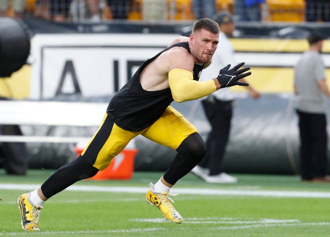 Pittsburgh Steelers linebacker T.J. Watt (90) warms up before a game against the Buffalo Bills at Acrisure Stadium.