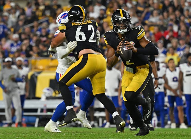 Justin Fields of the Pittsburgh Steelers scrambles out of the pocket in the third quarter during the preseason game against the Buffalo Bills at Acrisure Stadium on August 17, 2024 in Pittsburgh, Pennsylvania.