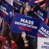 This photo shows a crowd of people at the Republican National Convention in July 2024. Many are holding up signs reading 